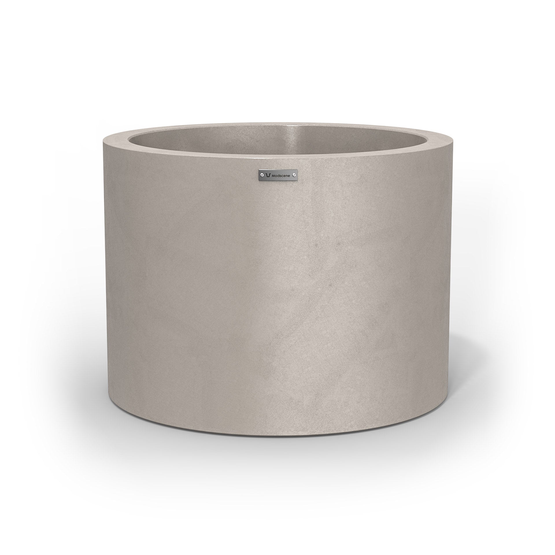A cylinder shaped pot planter with a concrete look finish.