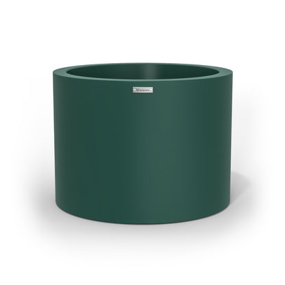 A cylinder shaped pot planter in a emerald green colour.