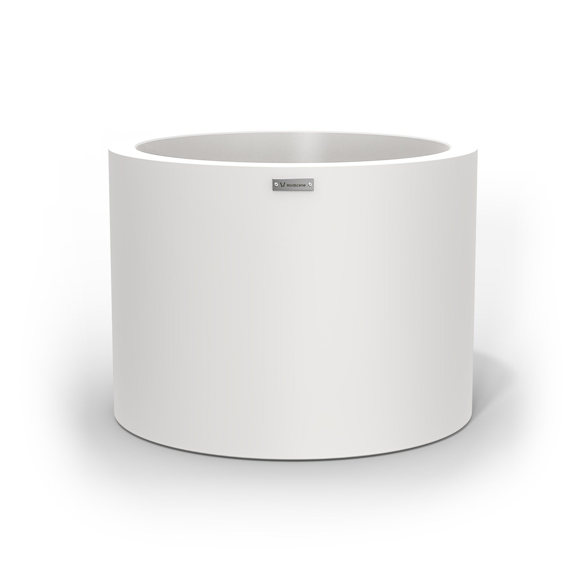 A cylinder shaped pot planter in white made by Modscene NZ. 