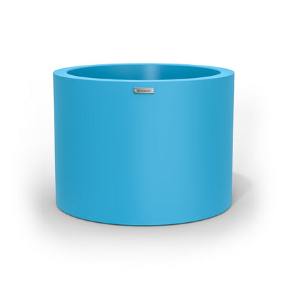 A cylinder shaped pot planter in blue made by Modscene New Zealand. 