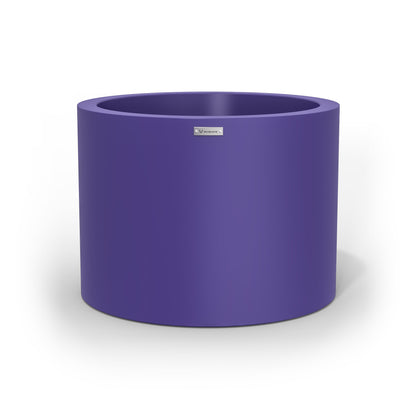 A cylinder shaped pot planter in purple made by Modscene NZ. 