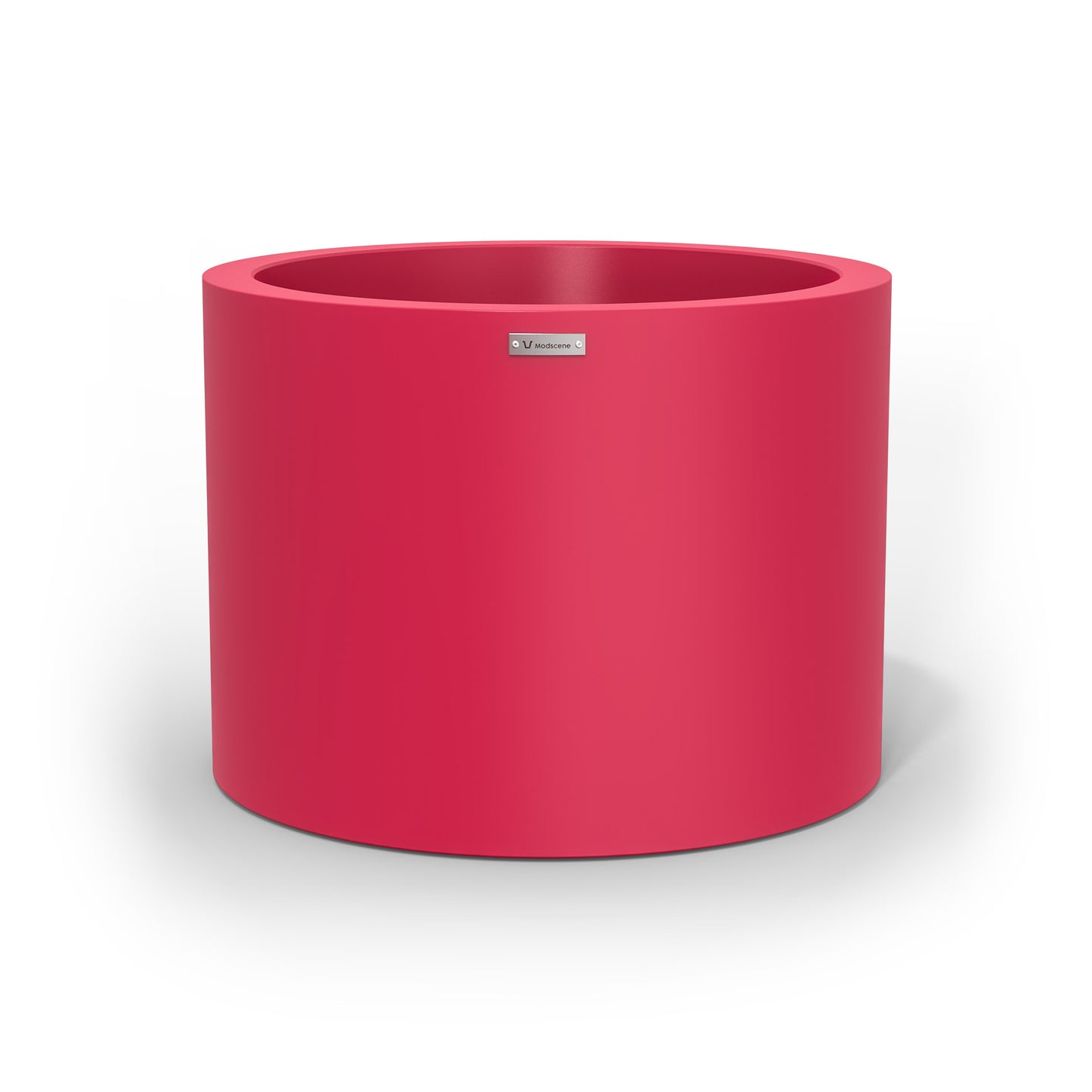 A cylinder shaped pot planter in pink made by Modscene NZ. 