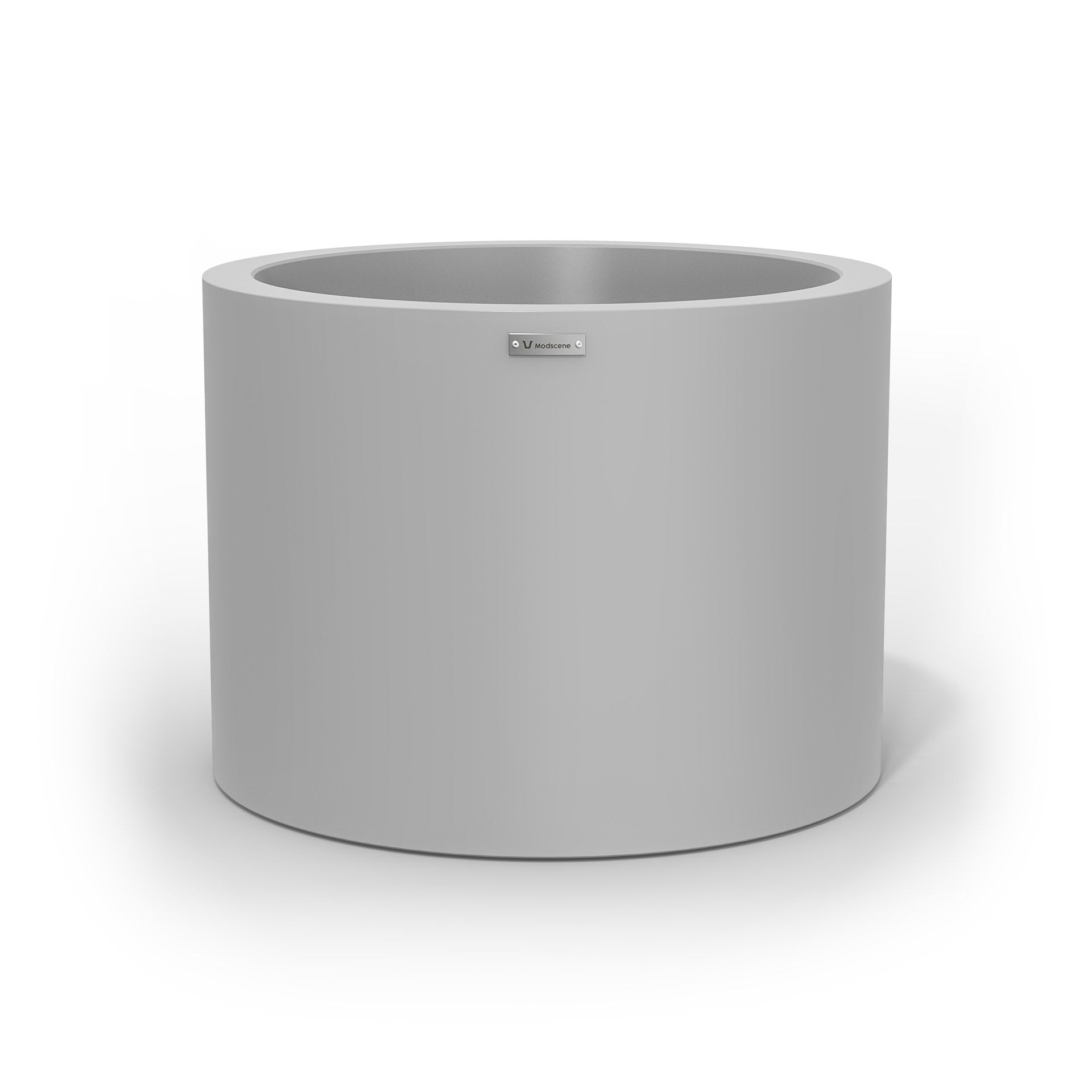 A cylinder shaped pot planter in a light grey colour.