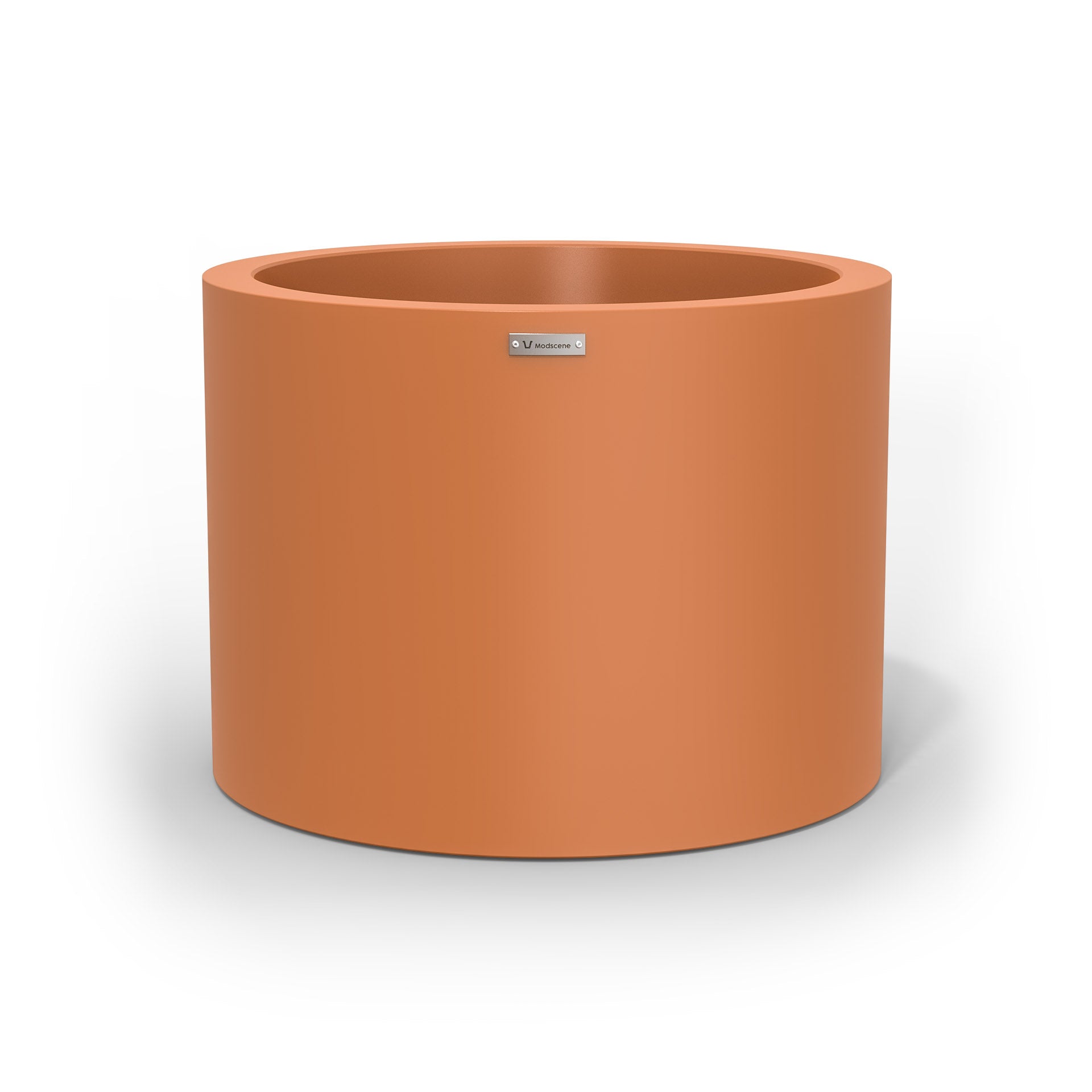 A cylinder shaped pot planter in terracotta made by Modscene NZ. 