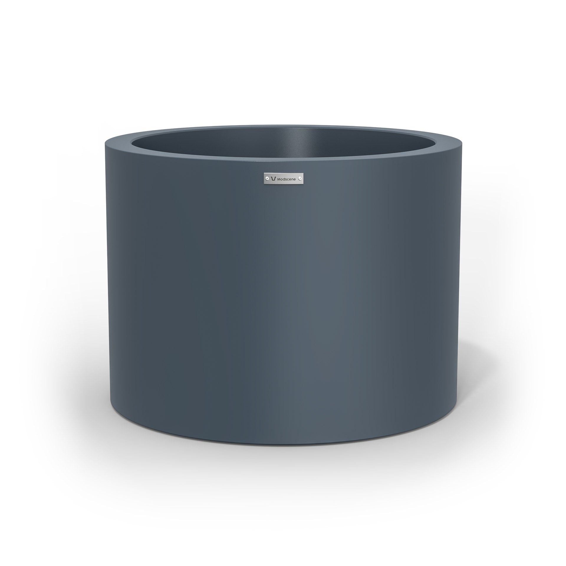 A cylinder shaped pot planter in a dark grey colour. NZ made.