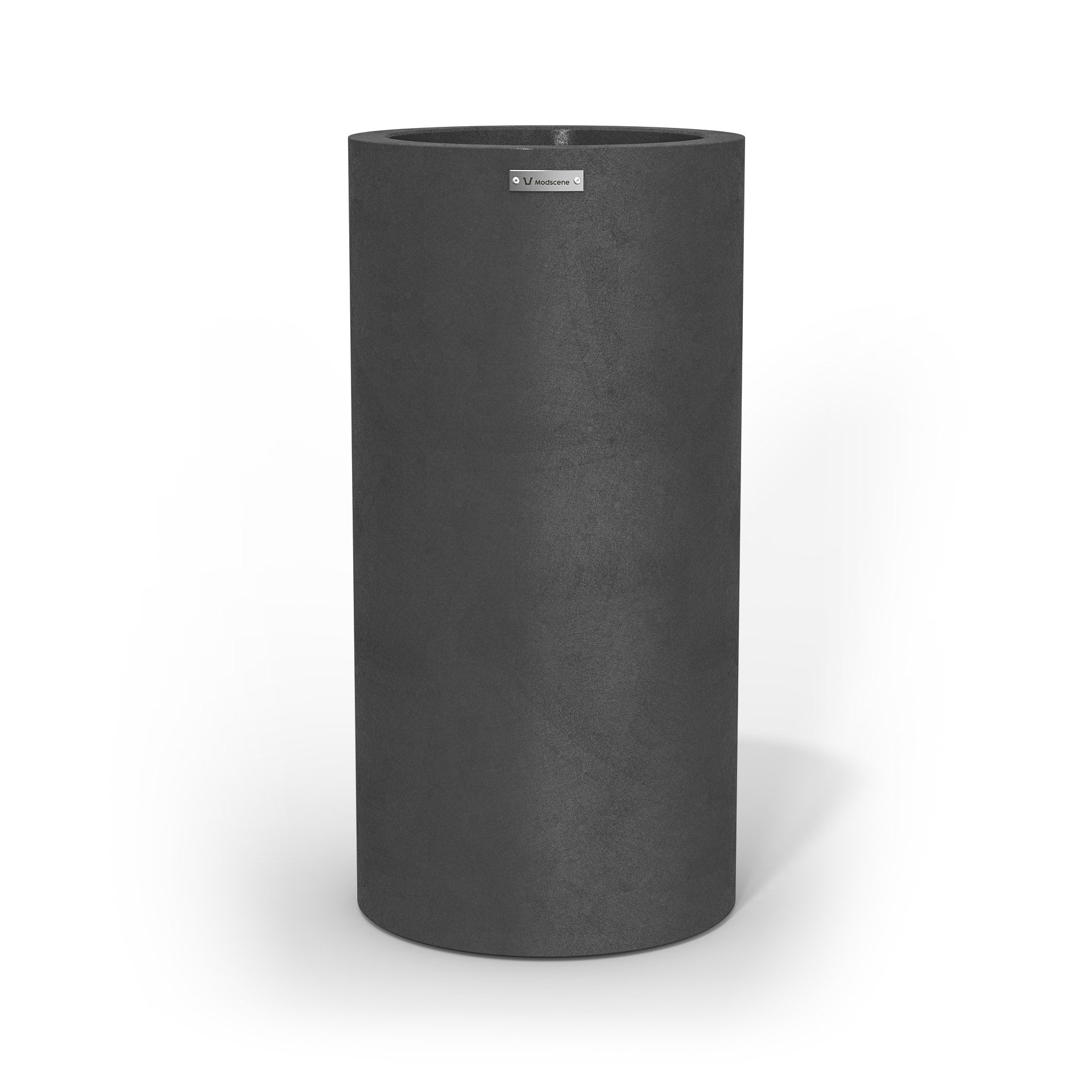 A large cigar cylinder pot planter in dark grey with a concrete look.