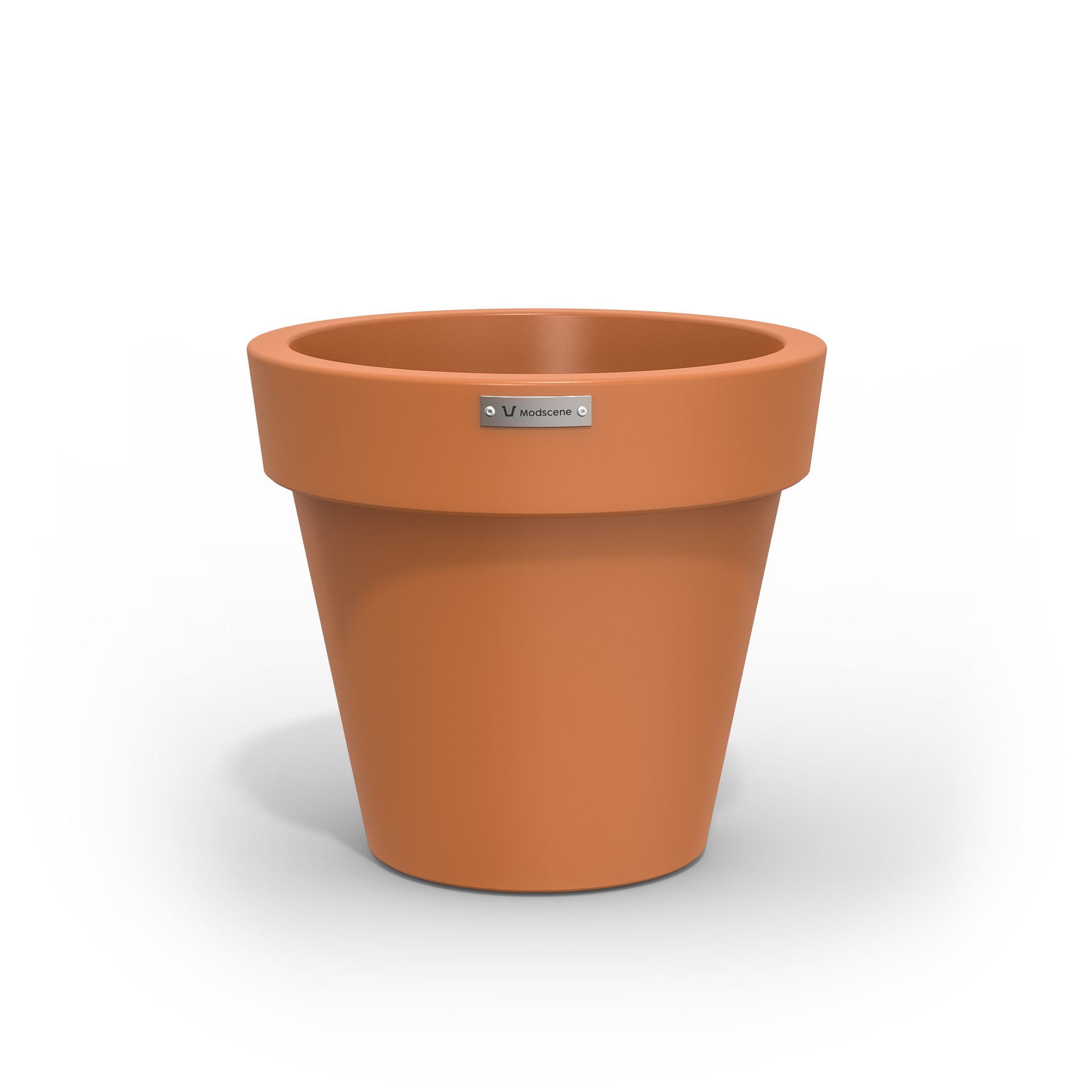 A Modscene plastic planter pot in a rustic terracotta colour. New Zealand made.