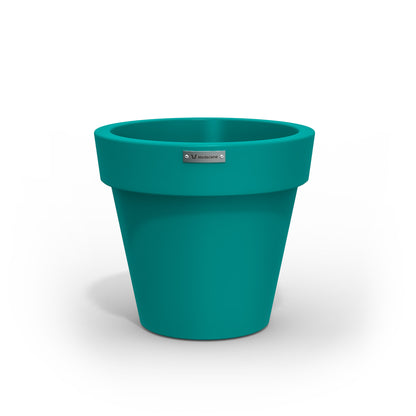 A Modscene plastic planter pot in a teal colour. NZ made.