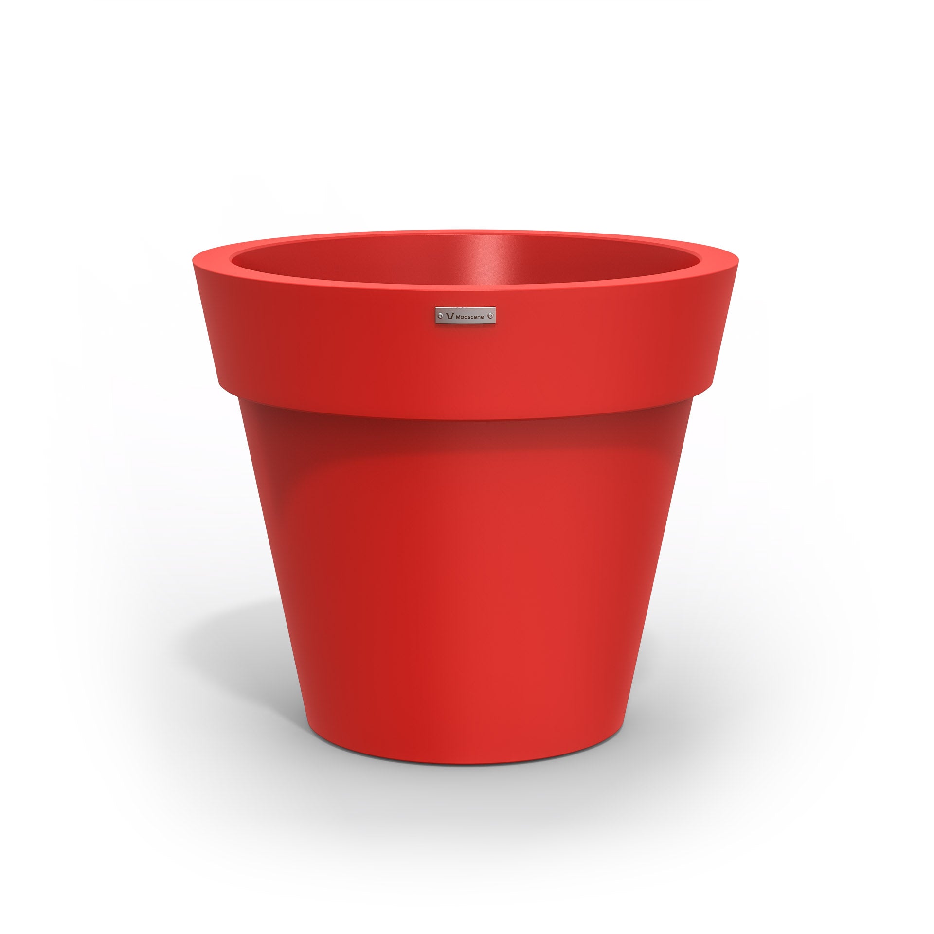 A Modscene plastic planter pot in a red colour. NZ made.