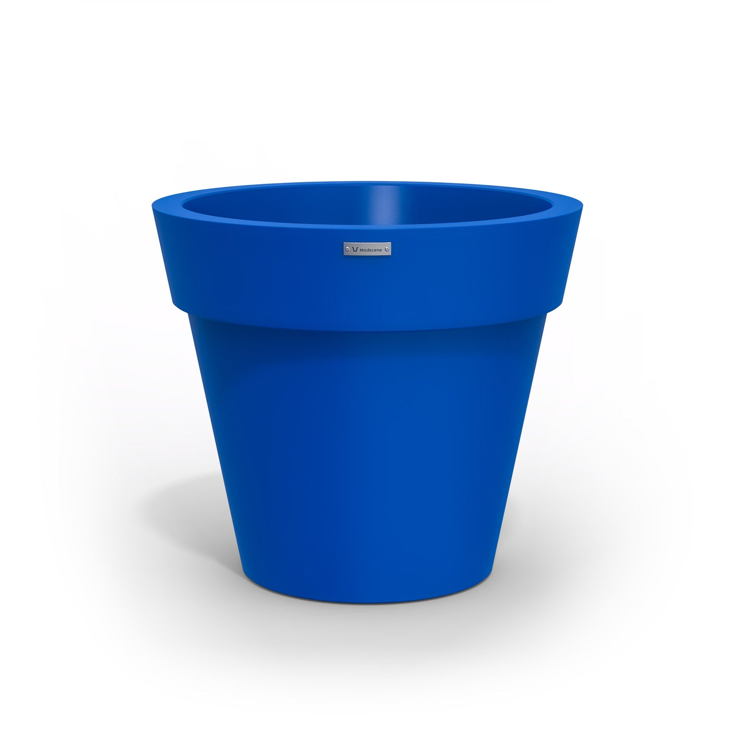 A Modscene plastic planter pot in a dark blue colour. New Zealand made.