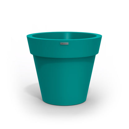 A Teal Modscene plastic planter pot made in New Zealand.