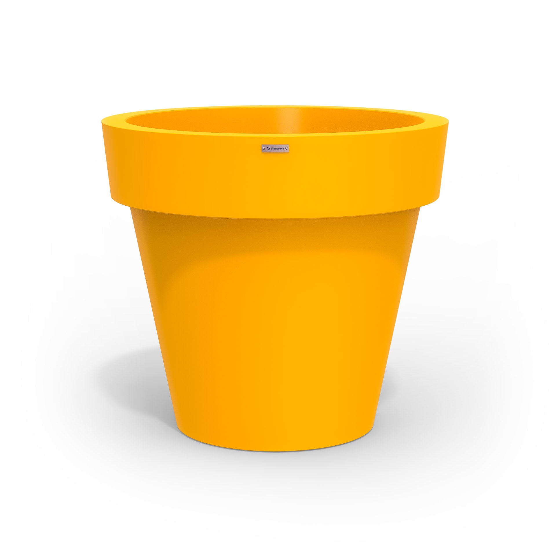A large yellow planter pot made by Modscene New Zealand.