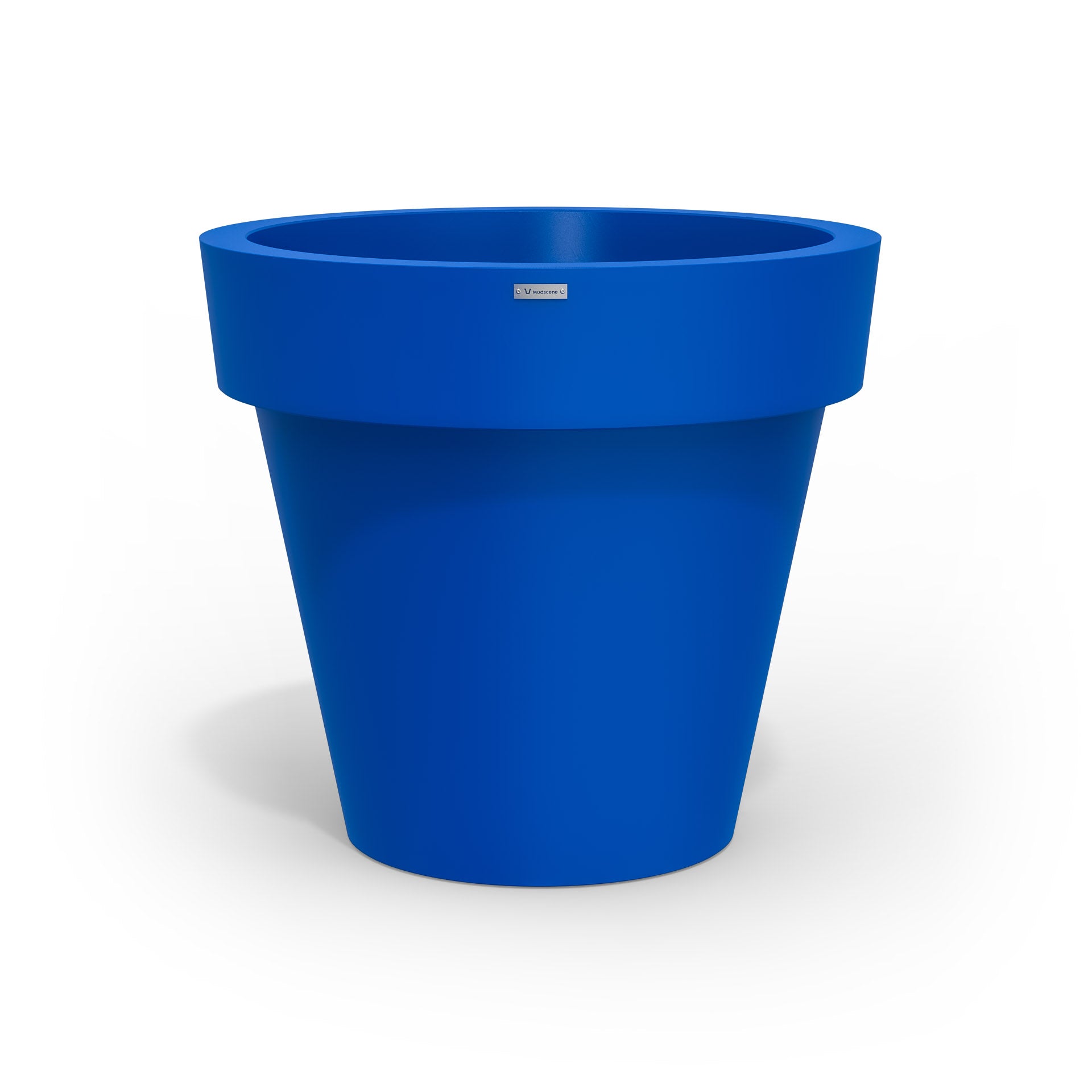 A large planter pot in a deep blue colour made by Modscene NZ.