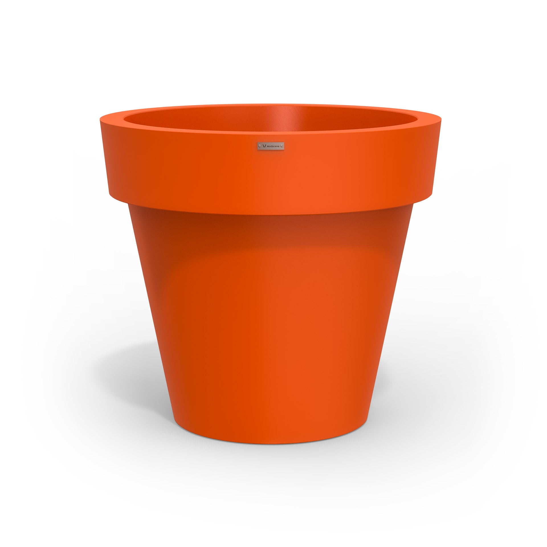 Large Modscene plastic planter pot in a orange colour. NZ made.