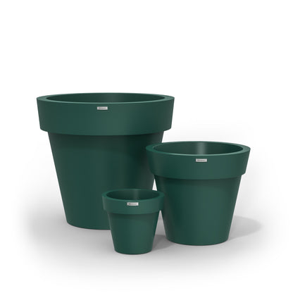 A cluster of three Modscene planter pots in a emerald green colour.