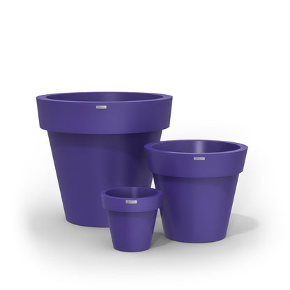 A cluster of three Modscene planters pots in a lavender purple colour. NZ made