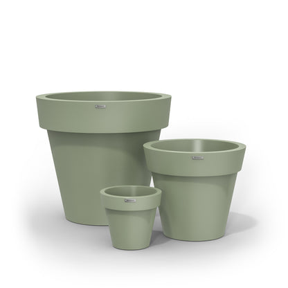 A cluster of three Modscene planter pots in a pastel green colour.