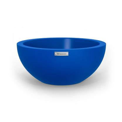 A small Modscene planter bowl in a dark blue colour. NZ made.