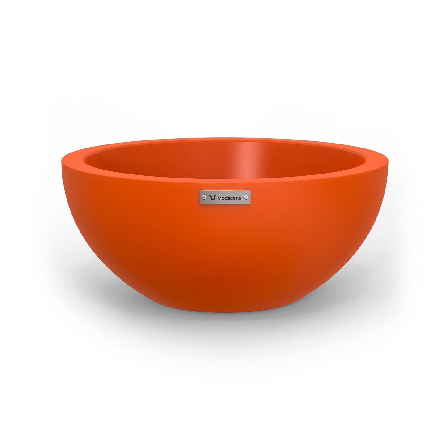 A small Modscene planter bowl in orange. New Zealand made.