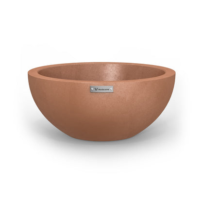 A small Modscene planter bowl in rustic terracotta. New Zealand made.