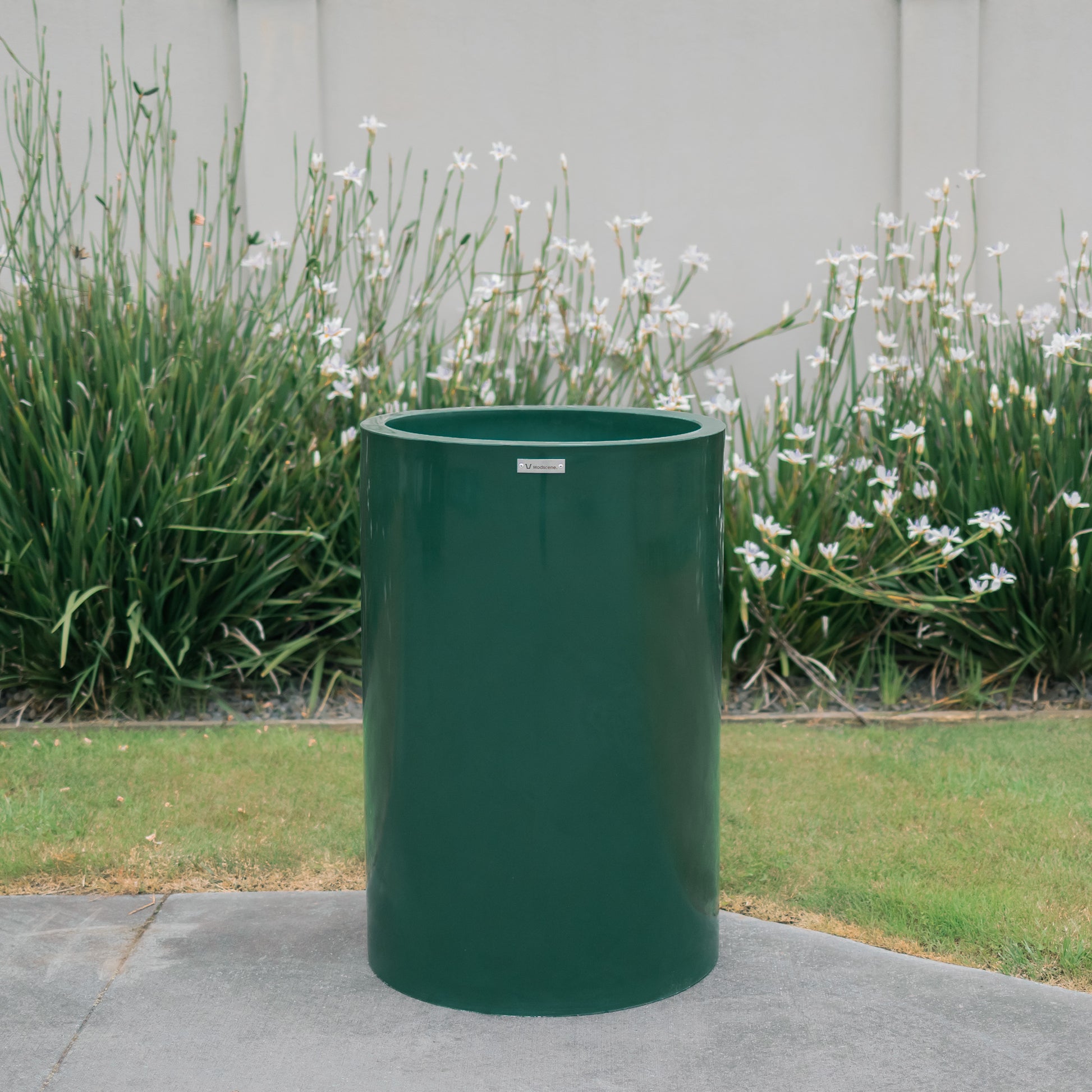 Tall cylinder planter pots in Emerald green.